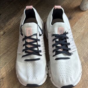 On Running White and Pink Athletic Shoes Sleek Design